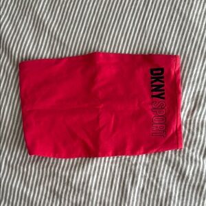 DKNY Pink Top with Sleek Design and Soft Fabric